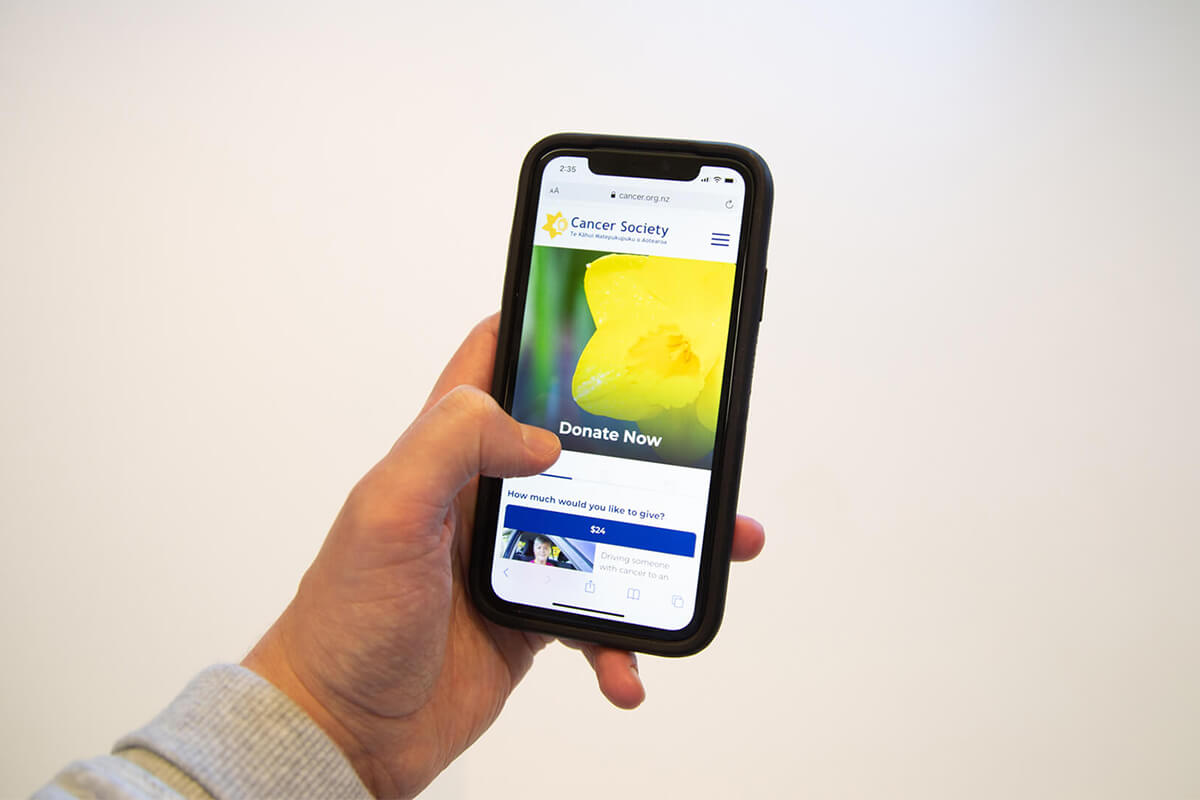 Cancer society website on mobile donation page