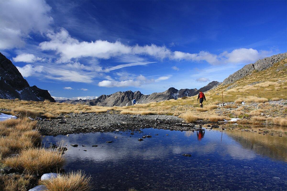 hiking lake blue sky