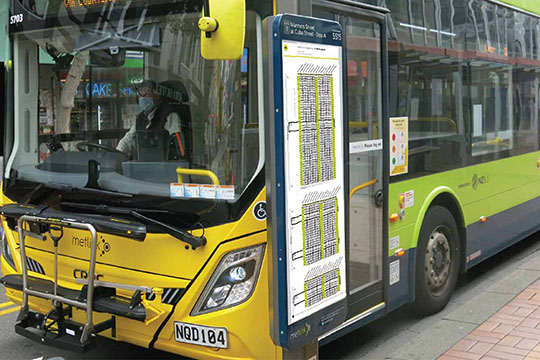metlink timetable with a bus in the background