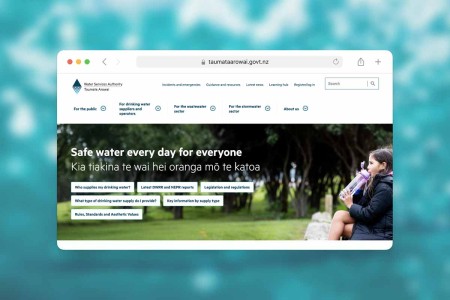 taumata arowai homepage displayed in front of blurred water background